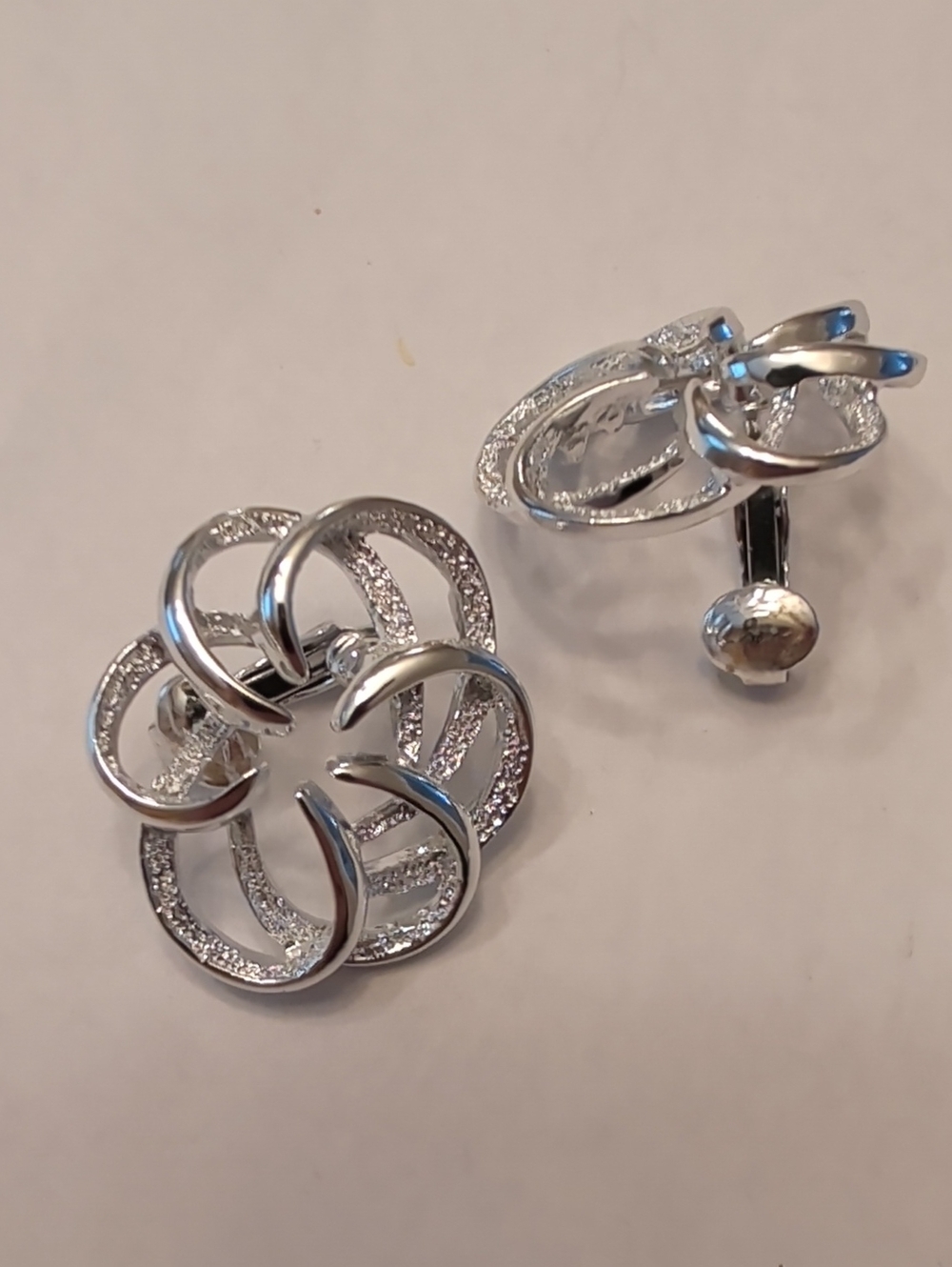 Sarah Coventry Silver Twisted Floral Clip-On Earrings
